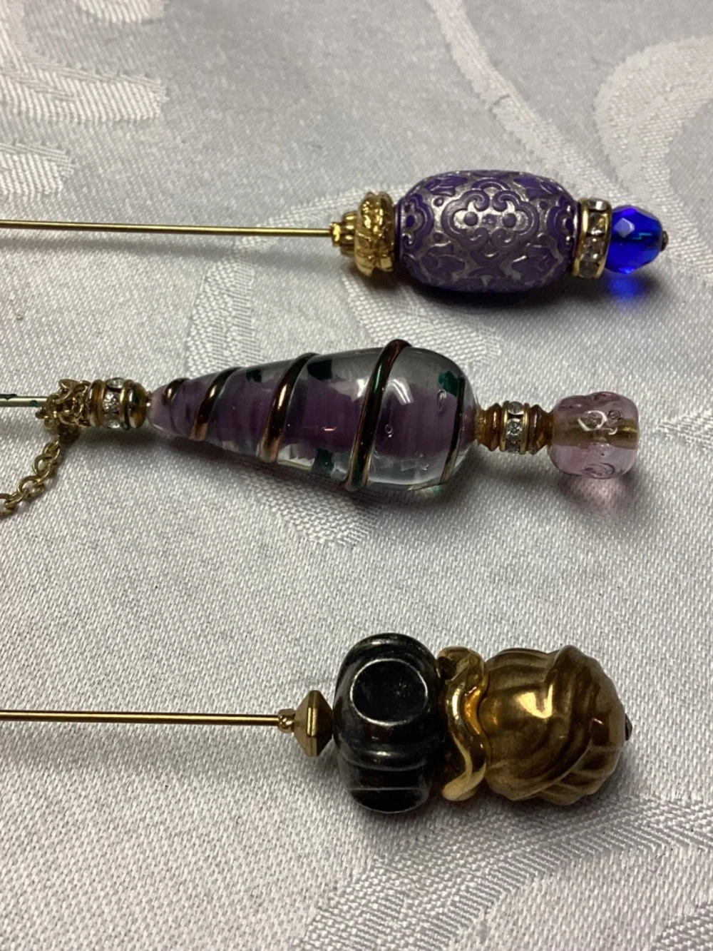 WOMENS sticking pins  3 piece lot fabulous. BROOCH / HAT. ETC